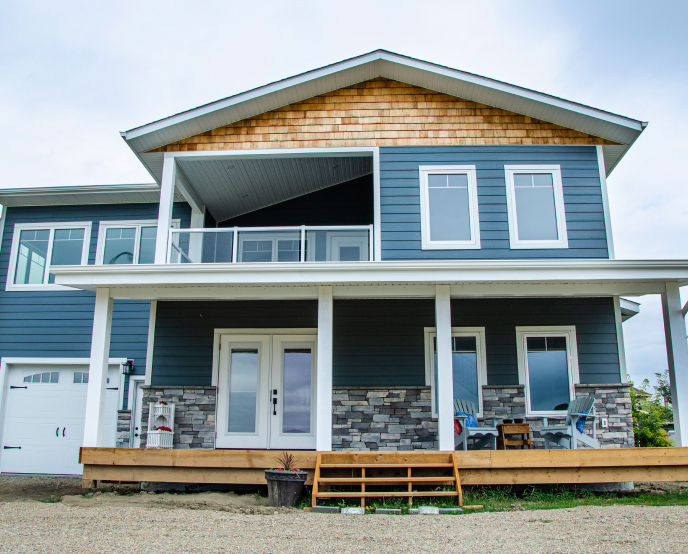 Two storey house with blue siding